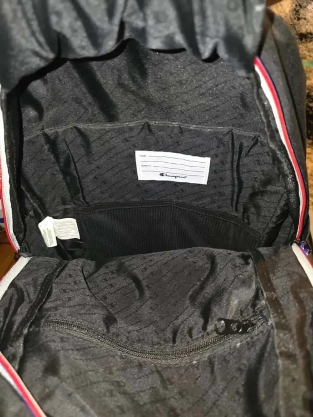 Champion Black Backpack with Red & Blue Logo Accent